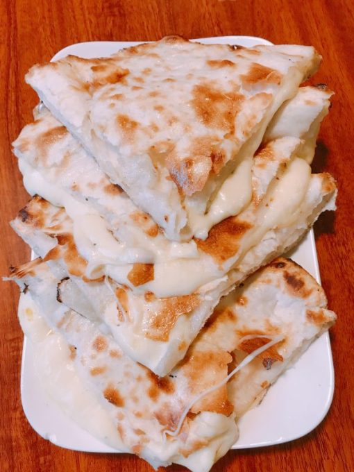 Oven-baked flatbread with cheese