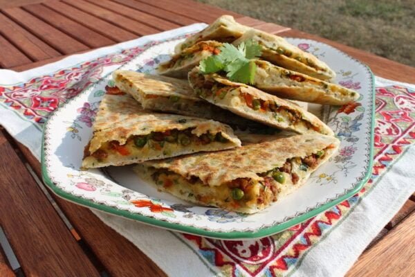 Keema Naan Soft, unleavened bread with your choice of meat, prepared in tandoor.