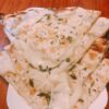 Oven-baked flatbread with cheese & garlic filling