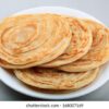 Tandoori Paratha Crispy whole wheat layered bread prepared in Traditional Clay Oven